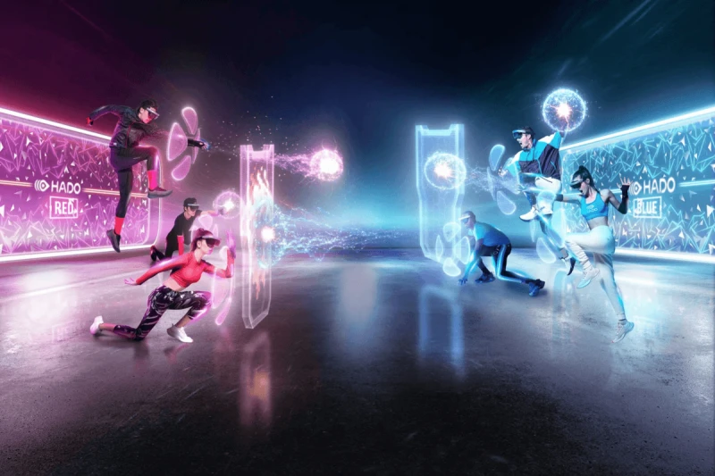 Two teams wearing AR headsets and activewear engaged in a futuristic augmented reality game with glowing shields and energy orbs.
