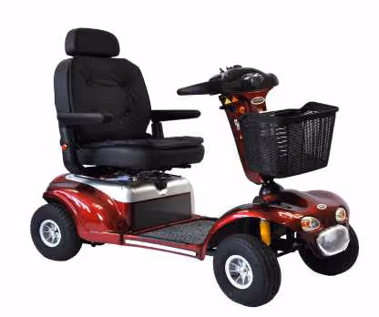 Red four-wheeled mobility scooter with black seat and front basket.
