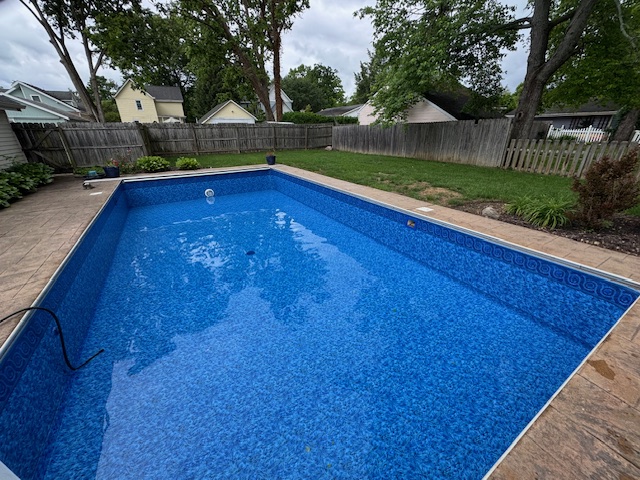 Custom inground pool with paver decking near Alexandria, Kentucky
