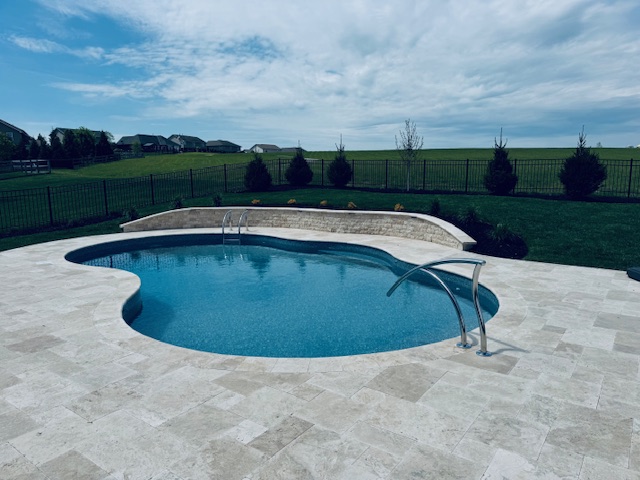 Freeform inground pool on open ground near Fayetteville, Ohio