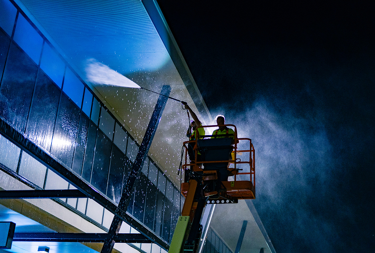 High-access industrial cleaning of large commercial building exterior