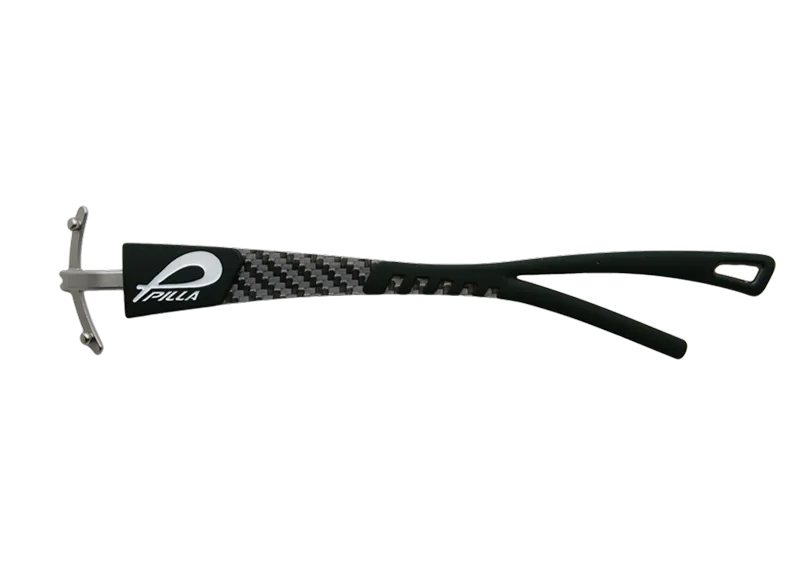 Black and carbon fiber speargun with a metal spear tip and handle cutouts labeled Pilla.