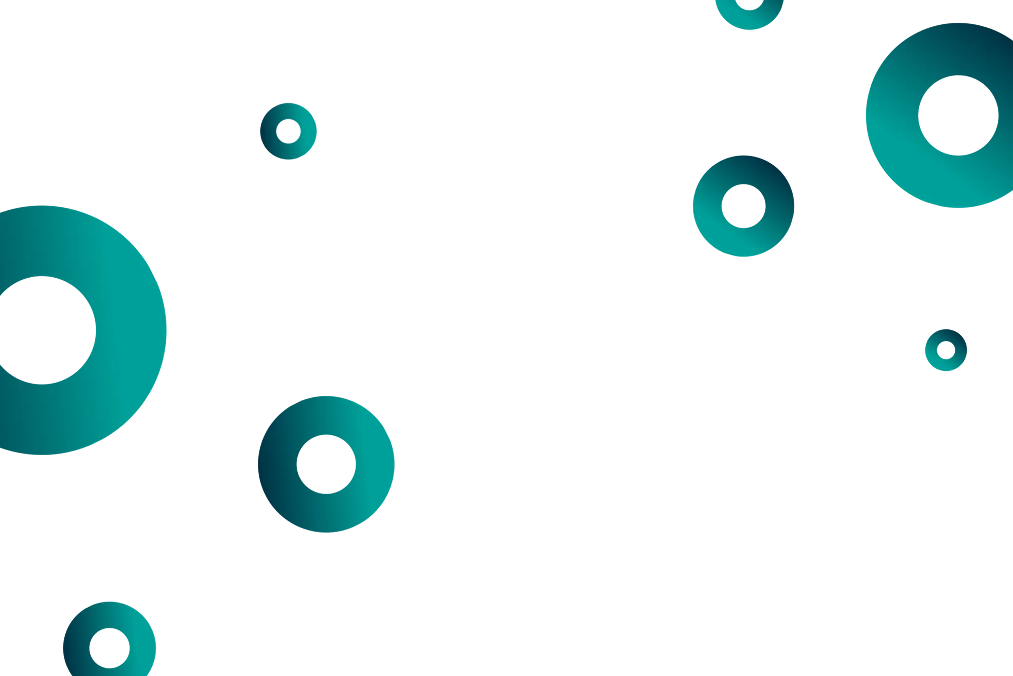 Teal blue rings of varying sizes scattered on a black background.