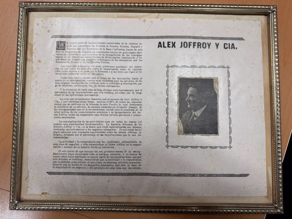 Framed vintage document titled ALEX JOFFROY Y CIA with a portrait photograph on the right side.