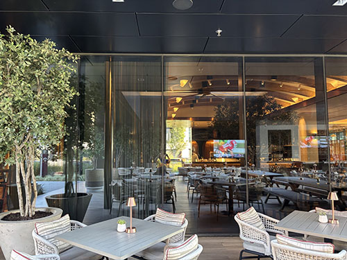 After picture of a commercial window tint installation by Starmor at a hotel restaurant in Arlington, TX.