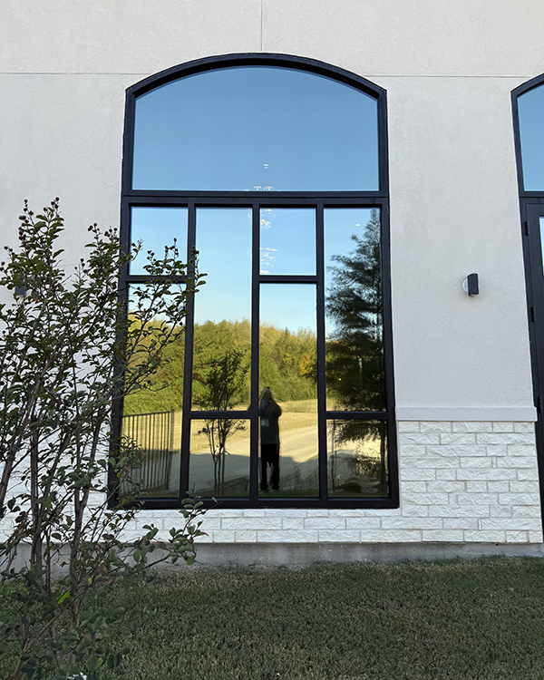 Exterior view of Llumar DR15 window film in Desoto, TX after commercial window film installation