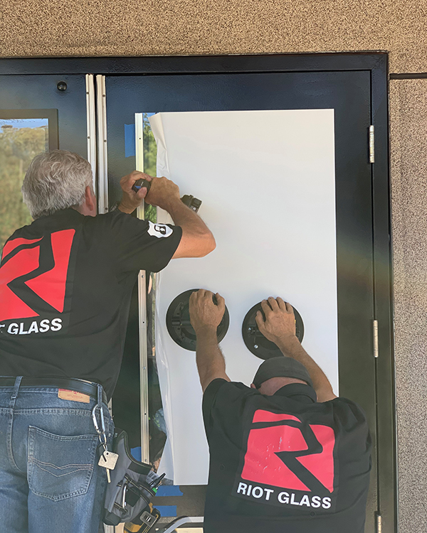 Riot Glass Door Retrofit for store security