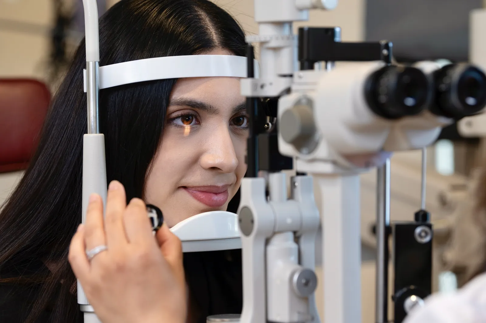 Patient at the slit lamp during an eye health exam at Southside Eyecare