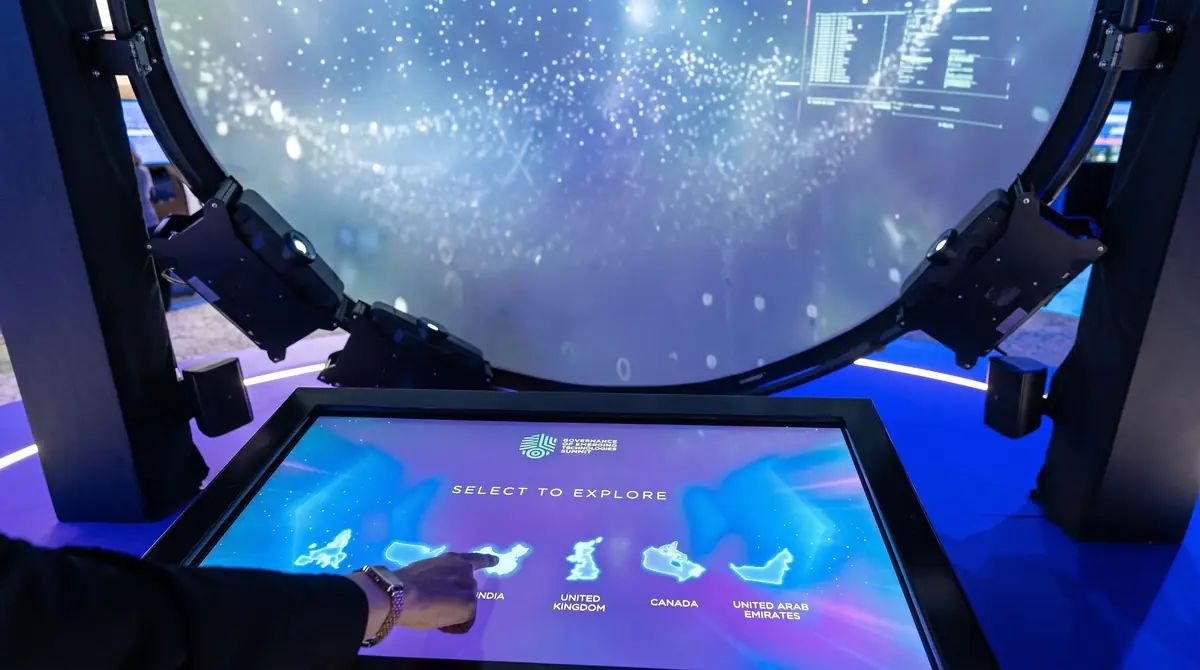 Touchscreen triggering country journeys in the GETS Summit open dome
