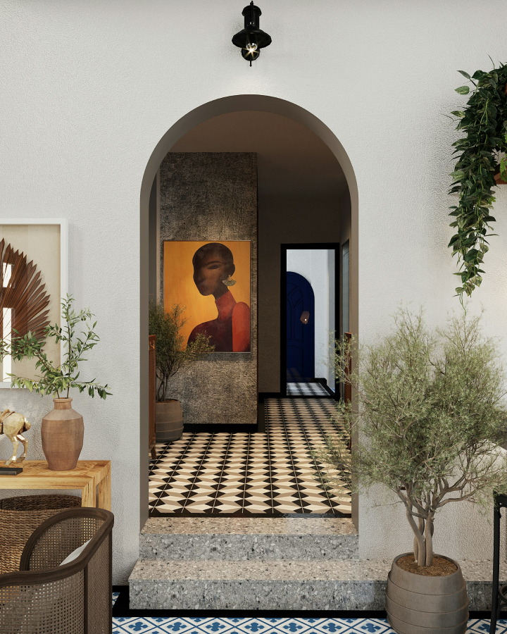 Interior entryway with an arched doorway, terrazzo steps, patterned black and white tile floor, potted plants, wall art featuring a stylized portrait of a woman, and a modern light fixture above the arch.