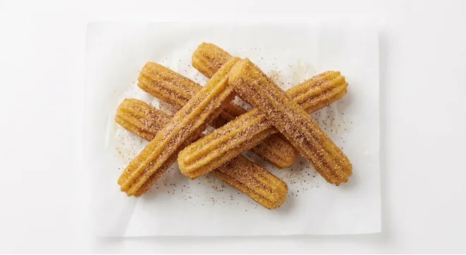 Wingstop Churros, sugar-dusted churros on white paper, nutrition and calories