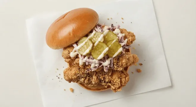 Wingstop Brazilian Citrus Pepper Burger, crispy chicken burger with Brazilian citrus pepper seasoning, pickles and slaw in a brioche bun, nutrition and calories