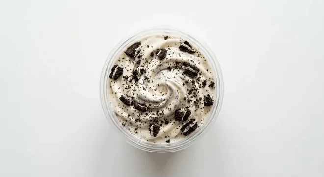 McDonald's Oreo McFlurry (Regular), soft serve ice cream mixed with Oreo cookie pieces in a small cup, seen from above, nutrition and calories