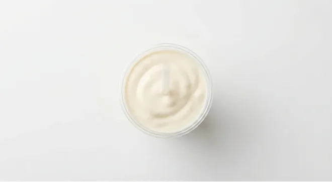 McDonald's Vanilla Milkshake (Large), vanilla milkshake in a clear cup, seen from above, nutrition and calories