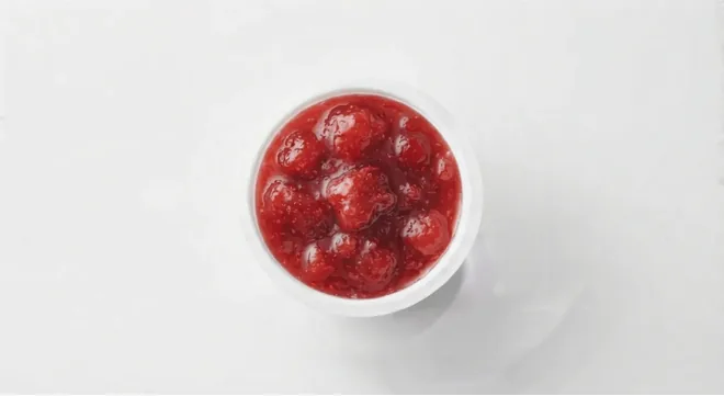 McDonald's Strawberry Jam, strawberry jam in a small white pot, seen from above, nutrition and calories