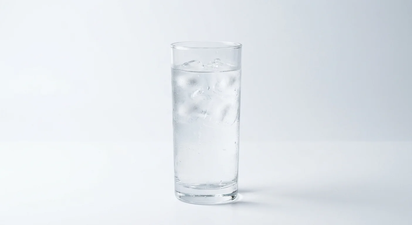 Dave's Hot Chicken Still Water 330ml Can, still water over ice in a tall clear glass, nutrition and calories
