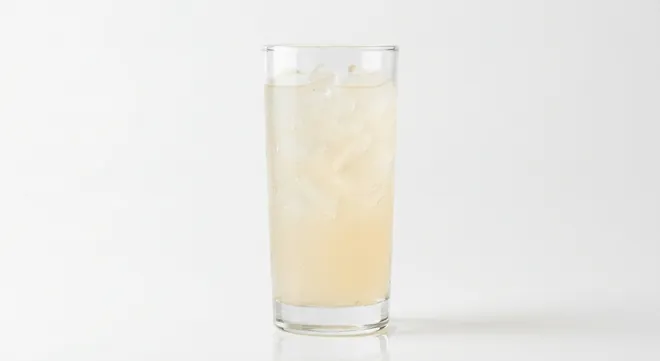 Burger King US Minute Maid Lemonade (Large), a pale cloudy lemonade over ice in a tall clear glass, nutrition and calories