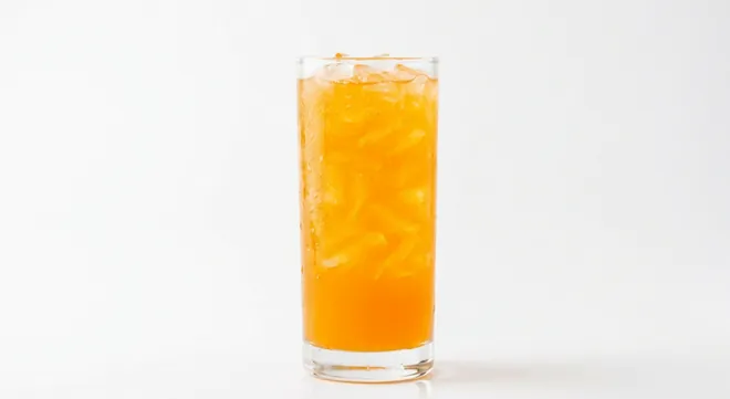 Burger King US Hi-C Orange (Large), a bright orange fruit drink over ice in a tall clear glass, nutrition and calories