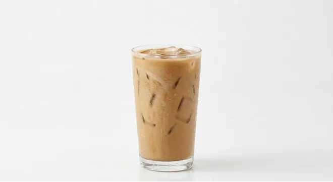 Burger King US Plain Iced Coffee (Extra Large), a milky iced coffee over ice in a tall clear glass, nutrition and calories