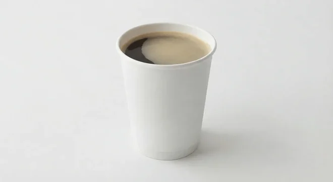 LEON Americano (Large), black americano in a plain white paper cup, nutrition and calories