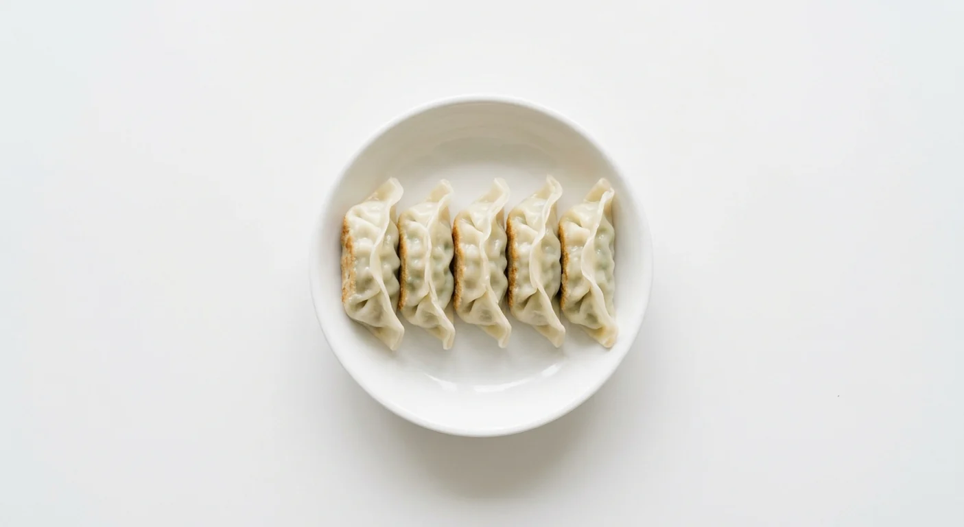 Wagamama Yasai Vegetable Gyoza, five steamed vegetable gyoza dumplings in a white bowl, nutrition and calories