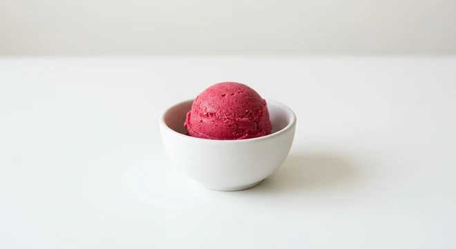Pizza Express Raspberry Sorbet (1 scoop), one scoop of raspberry sorbet in a white bowl, nutrition and calories