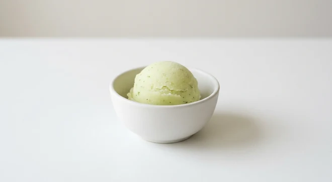 Pizza Express Lime and Basil Sorbet (1 scoop), one scoop of lime and basil sorbet in a white bowl, nutrition and calories