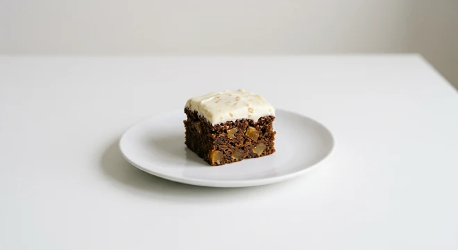 Pizza Express Dolcetti Stem Ginger Cake, small square of stem ginger cake with creamy frosting on a white plate, nutrition and calories