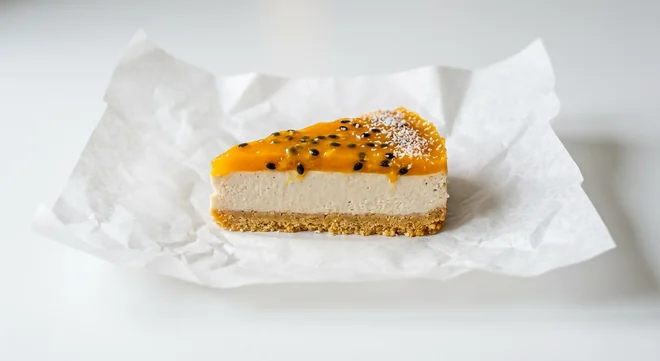 Caffè Nero Mango & Passionfruit Plant Based Cheesecake, plant based cheesecake slice topped with mango and passion fruit, nutrition and calories