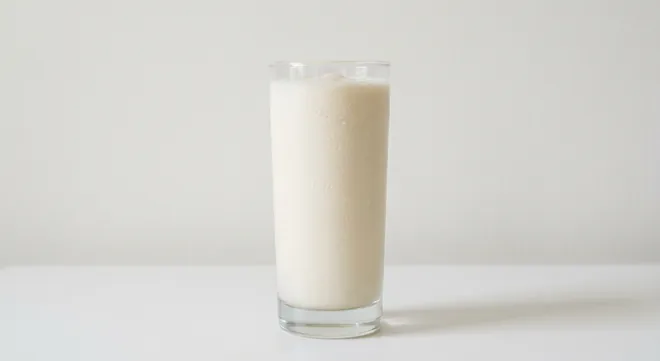 Caffè Nero Vanilla Milkshake, vanilla milkshake in a tall clear glass, nutrition and calories