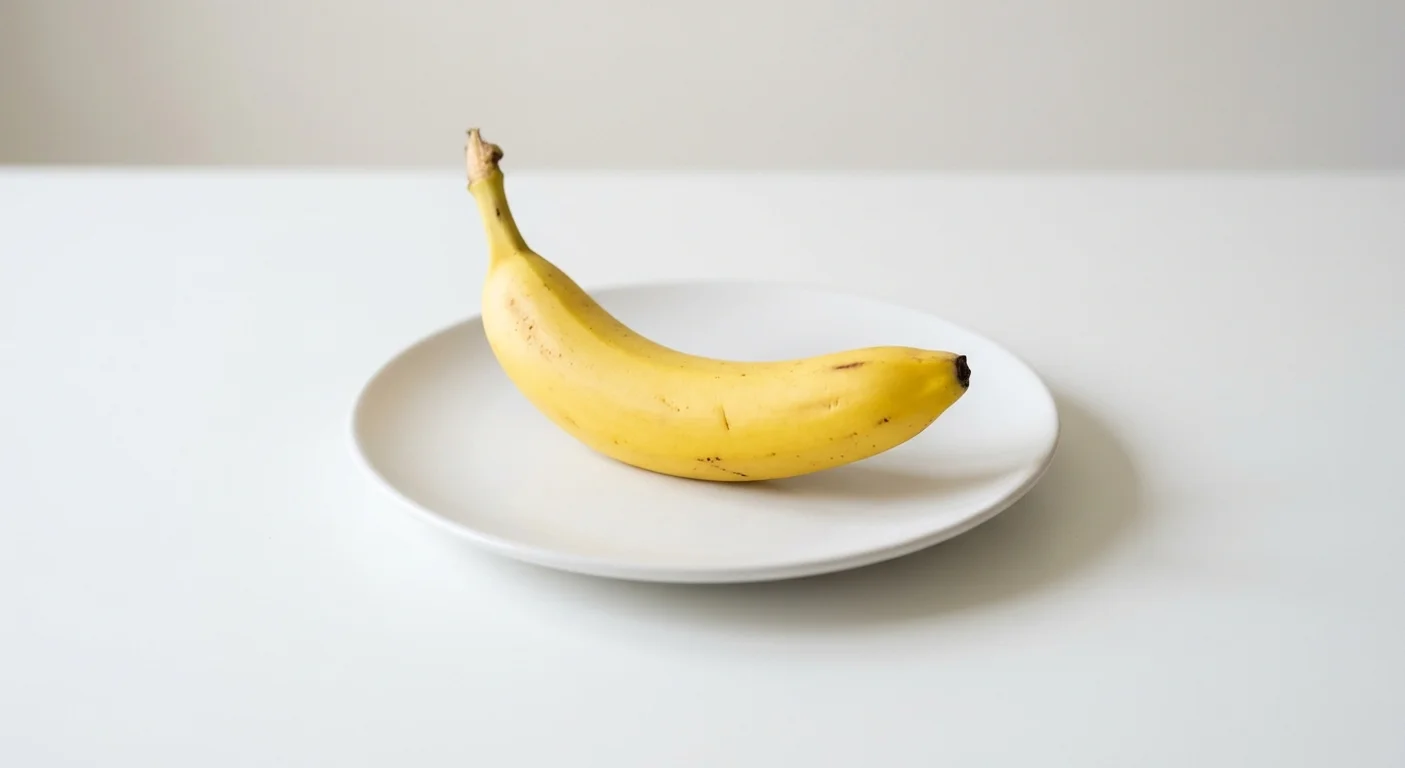 Pret A Manger Banana, whole banana on a white plate, nutrition and calories