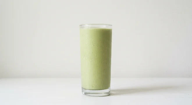 Pret A Manger Vanilla Matcha Frappe, blended vanilla matcha frappé in a clear glass, nutrition and calories