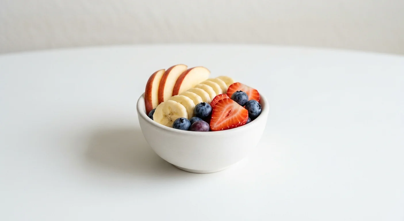 Wetherspoon Fresh Fruit Bowl, sliced apple, banana, strawberries and blueberries in a white bowl, nutrition and calories