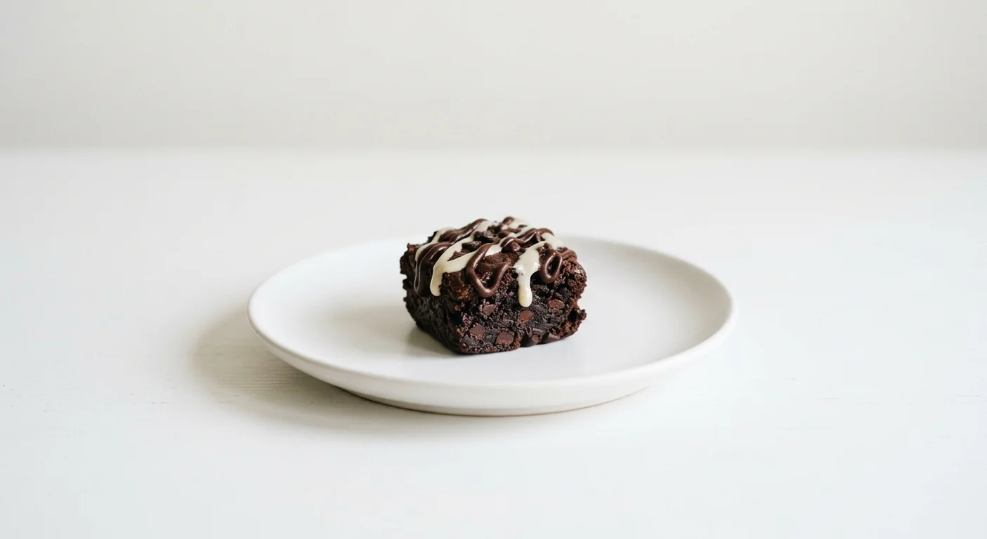 GAIL's Chocolate and Tahini Bite, small chocolate and tahini bite on a white plate, nutrition and calories
