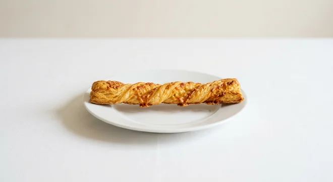 GAIL's Cheese Straw, twisted cheddar cheese straw on a white plate, nutrition and calories