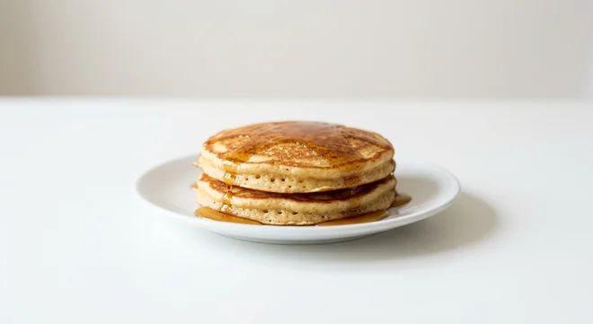 Wetherspoon Small American-Style Pancakes with Maple-Flavour Syrup, two American-style pancakes drizzled with maple syrup on a white plate, nutrition and calories