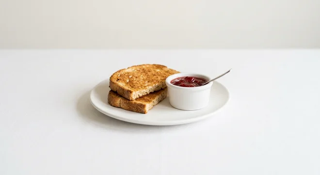 Wetherspoon Toast and Strawberry Jam, two slices of toast with a pot of strawberry jam on a white plate, nutrition and calories