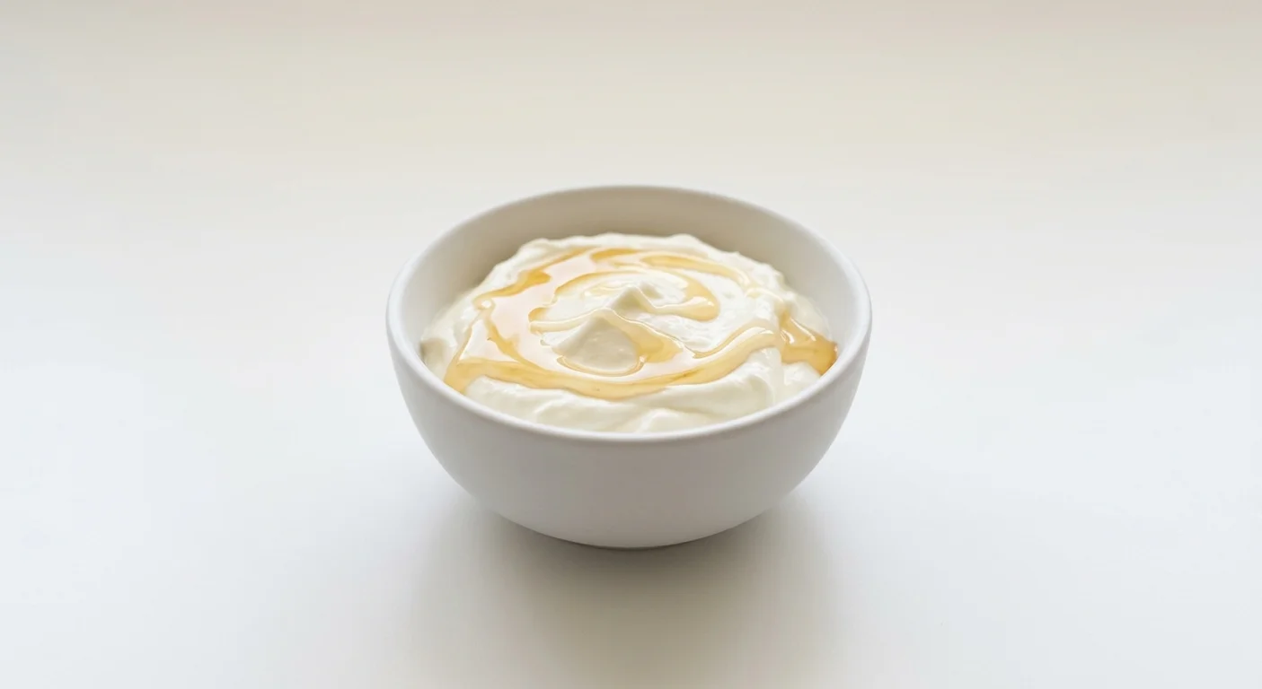 Wetherspoon Yoghurt Pot, Greek-style yoghurt with a drizzle of honey in a white bowl, nutrition and calories