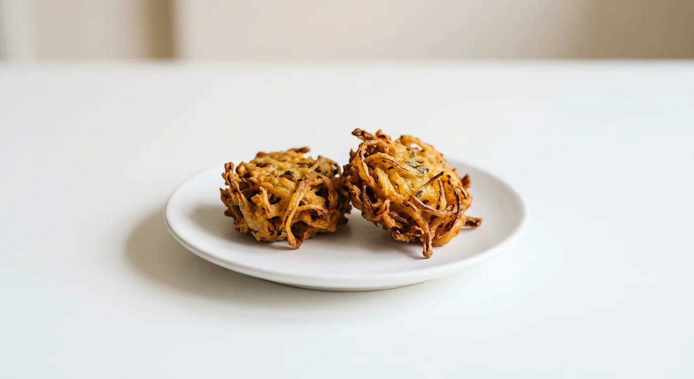 Wetherspoon Two Onion Bhajis, two crisp onion bhajis on a white plate, nutrition and calories