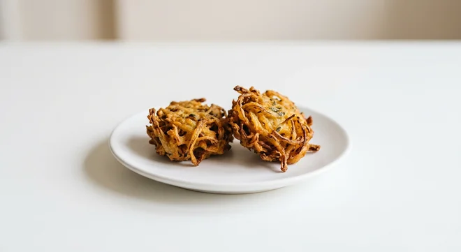Wetherspoon Two Onion Bhajis, two crisp onion bhajis on a white plate, nutrition and calories