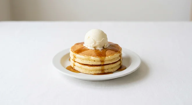 Wetherspoon Mini American-Style Pancakes with Ice Cream, two American-style pancakes with maple syrup and a scoop of vanilla ice cream on a white plate, nutrition and calories