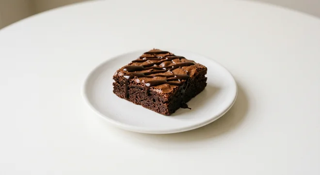 Wetherspoon Warm Chocolate Brownie, warm chocolate brownie with chocolate sauce on a white plate, nutrition and calories
