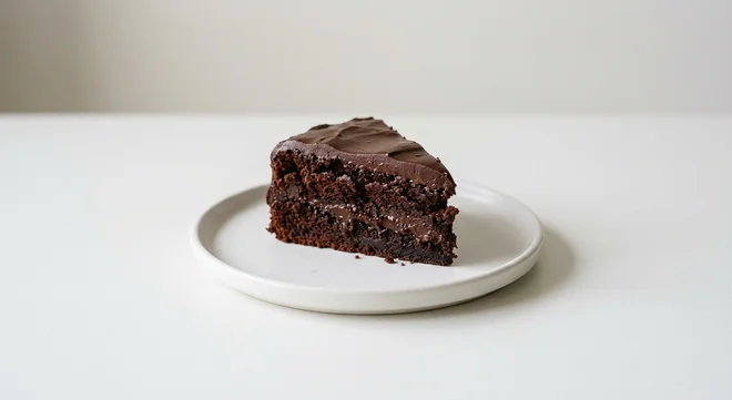 Wetherspoon Warm Chocolate Fudge Cake, slice of warm chocolate fudge cake on a white plate, nutrition and calories