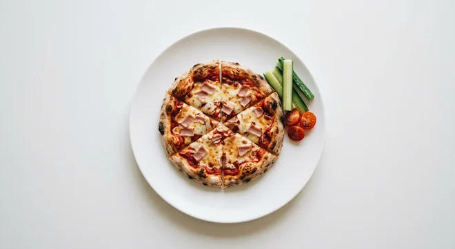 Wetherspoon Children's Ham and Cheese Pizza, small ham and cheese pizza, with cucumber sticks and cherry tomatoes on a white plate, nutrition and calories