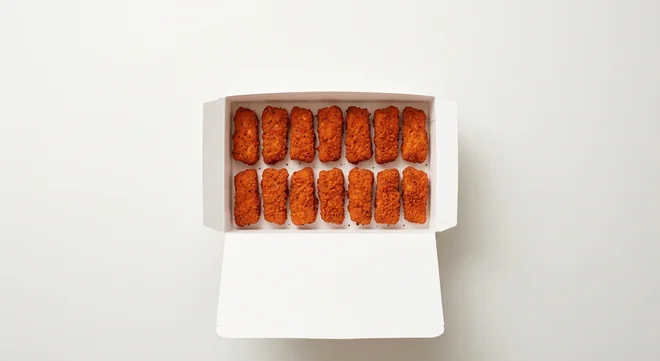 Domino's Chicken Kickers (14 pieces), 14 spicy breaded chicken kickers in a takeaway box, nutrition and calories