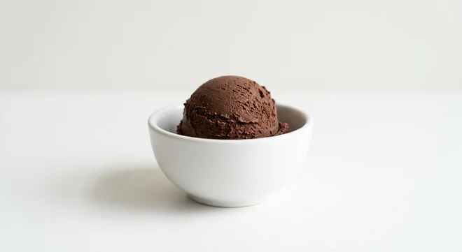 Frankie & Benny's Chocolate Ice Cream (Scoop), a scoop of chocolate ice cream in a white bowl, nutrition and calories