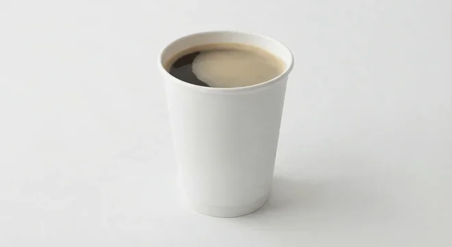 Burger King US Decaf Coffee (Small), hot black coffee in a plain white paper cup, nutrition and calories