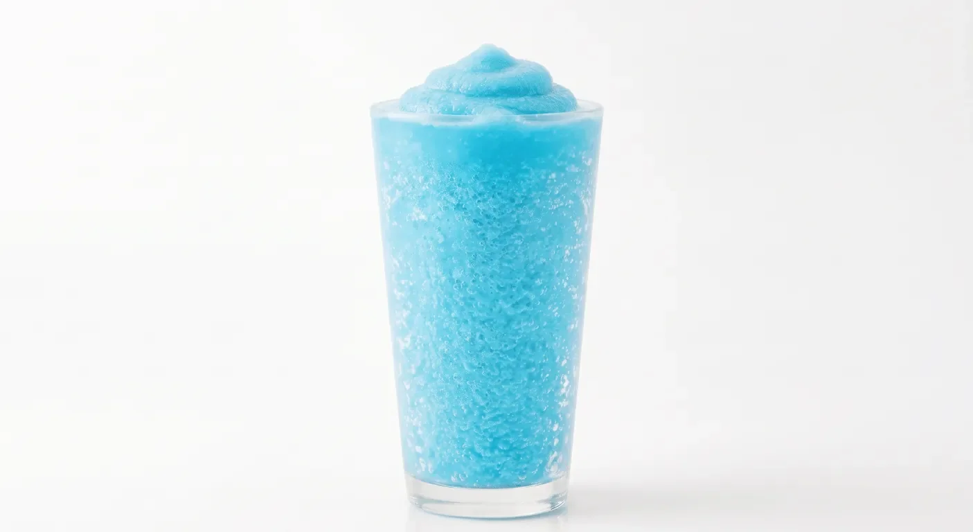 Burger King US Fanta Blue Raspberry Freezee King (Large), a bright blue frozen slush in a clear cup, nutrition and calories