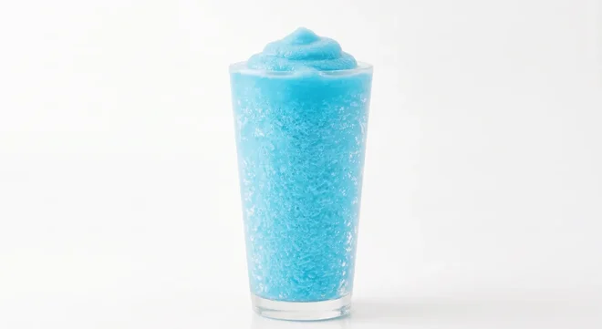 Burger King US Fanta Blue Raspberry Freezee King (Small), a bright blue frozen slush in a clear cup, nutrition and calories