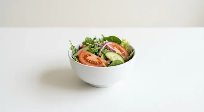 Frankie & Benny's Kids Side Salad, mixed leaf side salad with tomato, cucumber and red onion in a white bowl, nutrition and calories